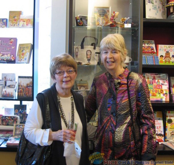 Jeanne Chamberlain and Maggie Richardson in front of a Mary Blair sell during a Walt Disney Family Museum Gift Shop.